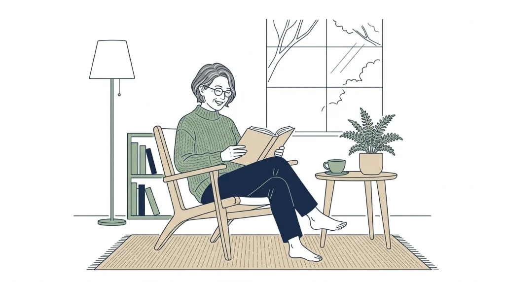 室内で読書をする女性